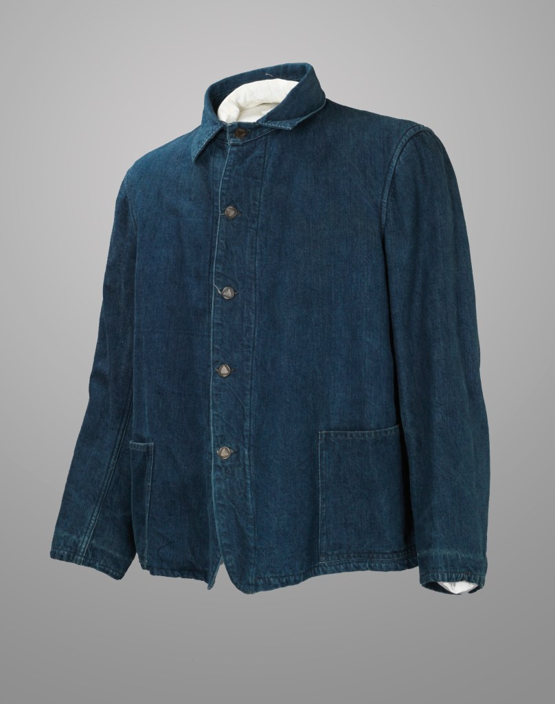 View of the front of a denim jacket.